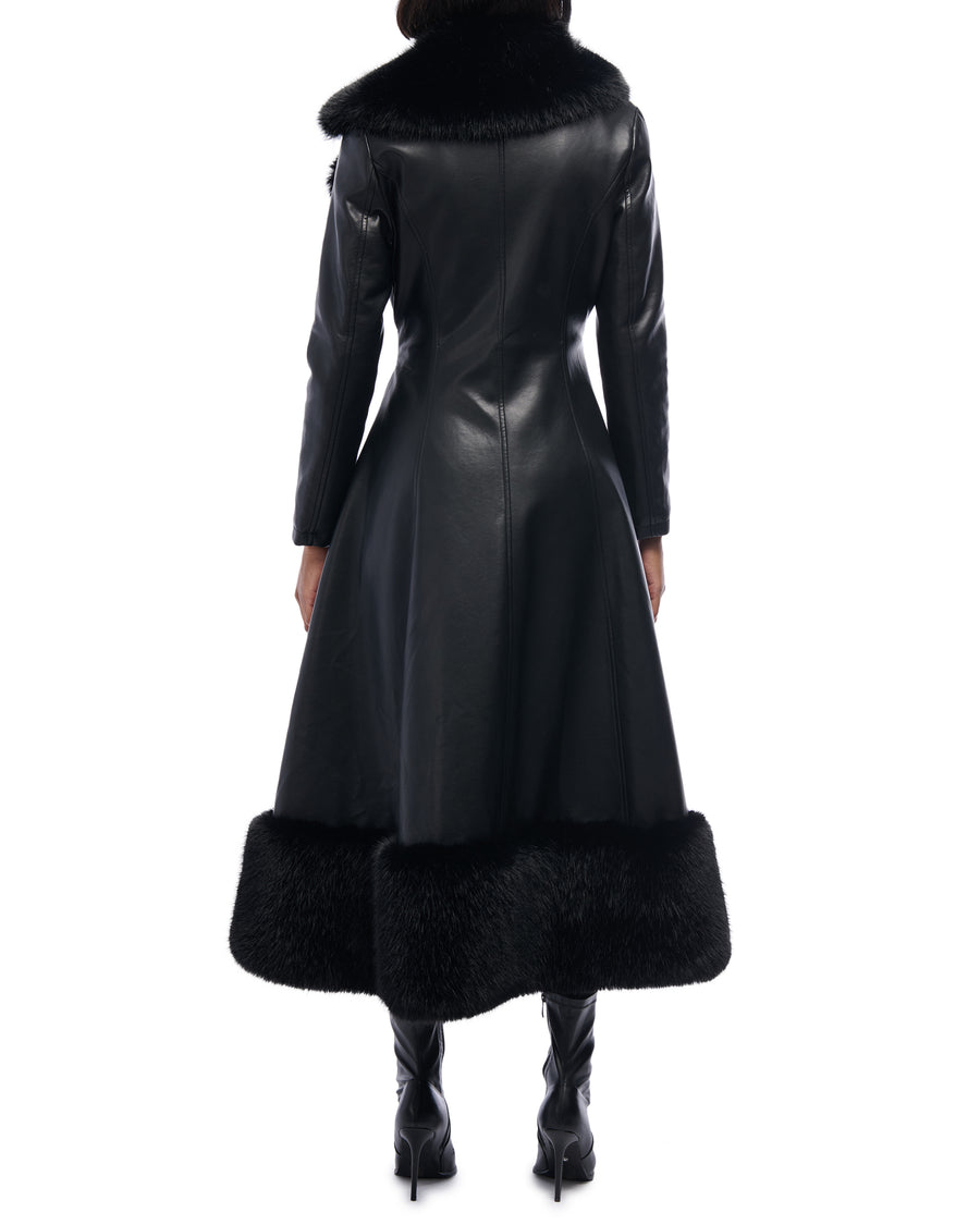 Black faux leather trench coat with a belted waist closure and black faux fur lined trim and collar