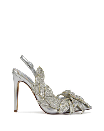 Metallic silver stiletto pumps with a slingback strap and crystal embellished flower petal embellishments on the side of the upper.