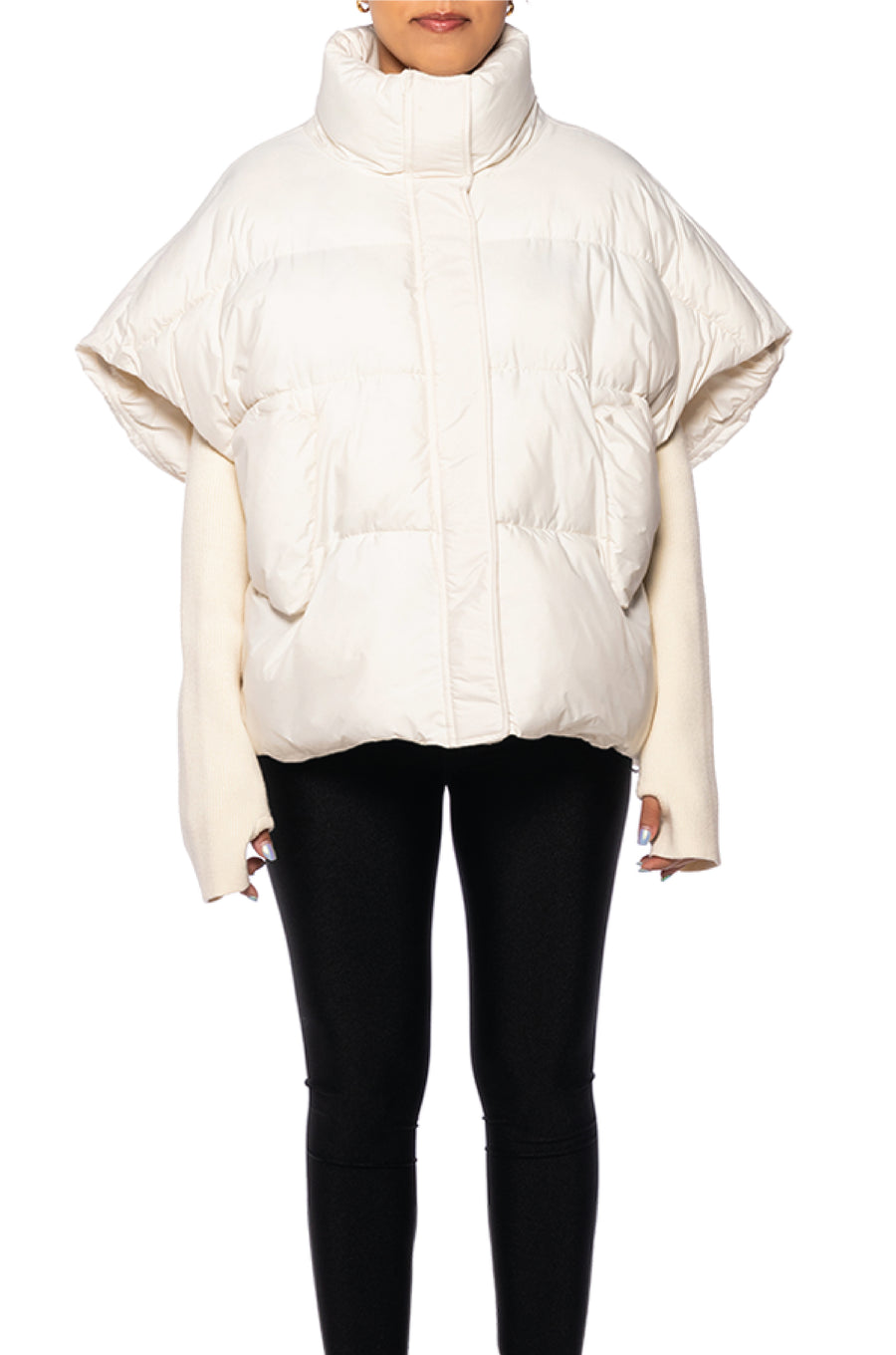 front view of unique white puffer jacket with a turtle neck white knit sleeves