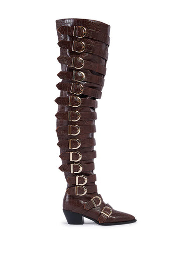brown faux leather thigh statement western boot  with gold hardware belted accents going up the shaft