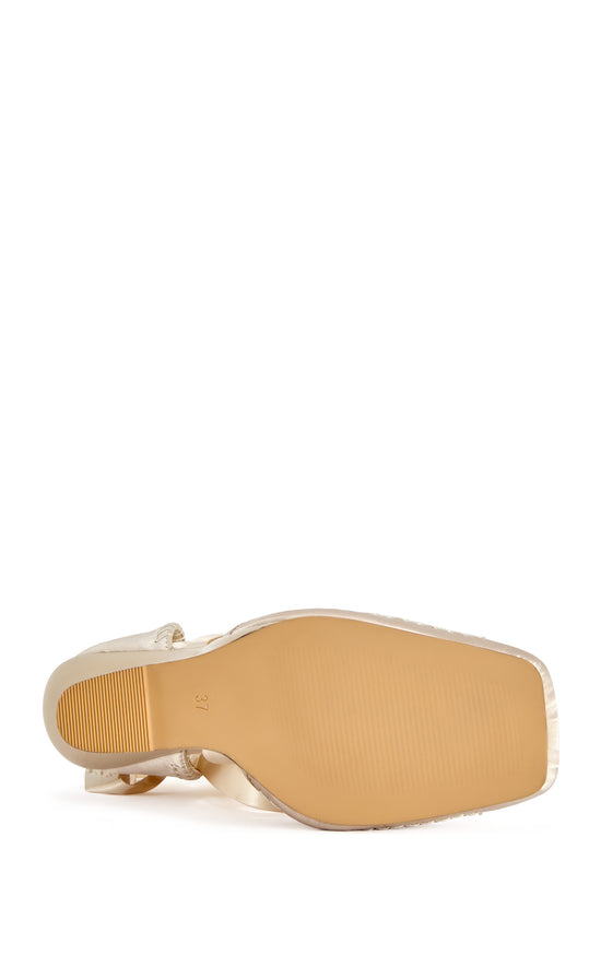 PIROUETTE-IVORY WRAP-AROUND WEDGE PUMP