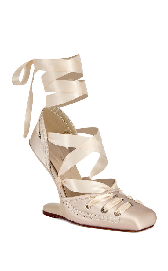 PIROUETTE-IVORY WRAP-AROUND WEDGE PUMP