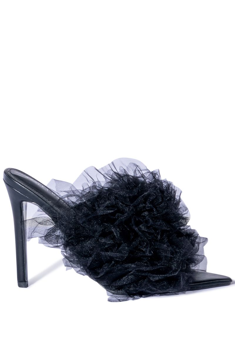 black pointed toe heels with ruffled tulle on the front strap