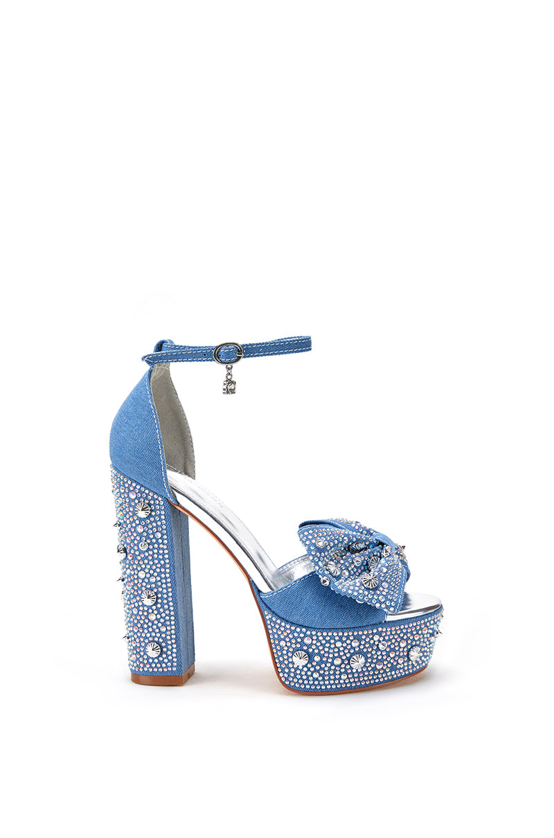denim platform heels with a peep toe and rhinestones with bow detail on front