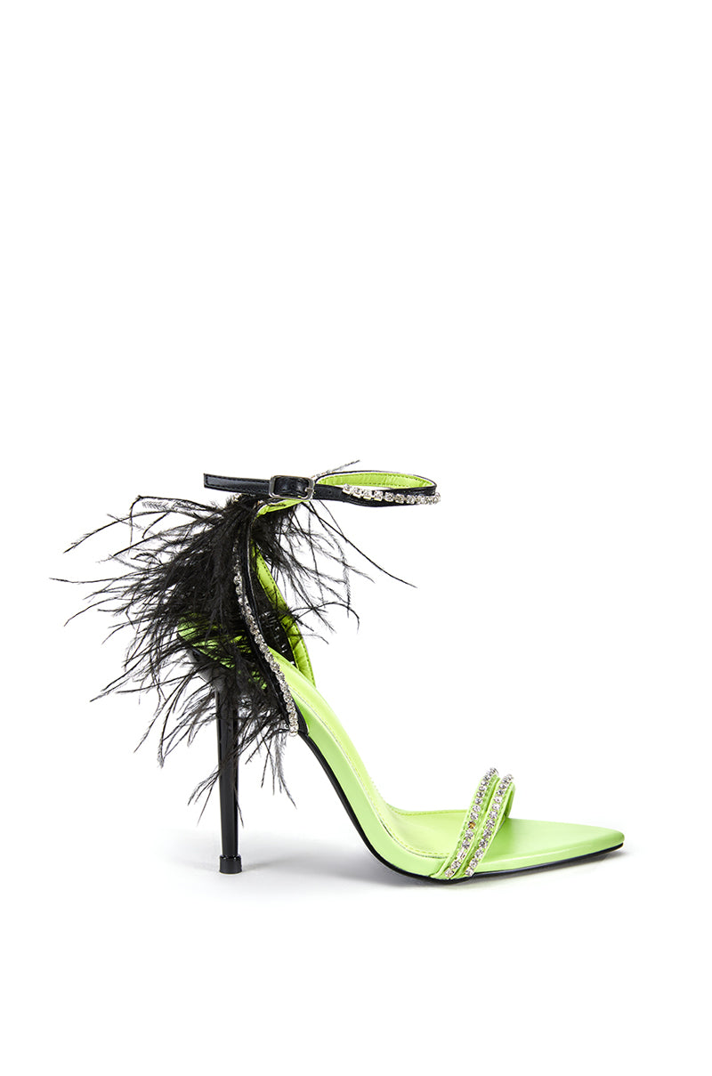 lime green open toe heels with rhinestone bands and black feather detail