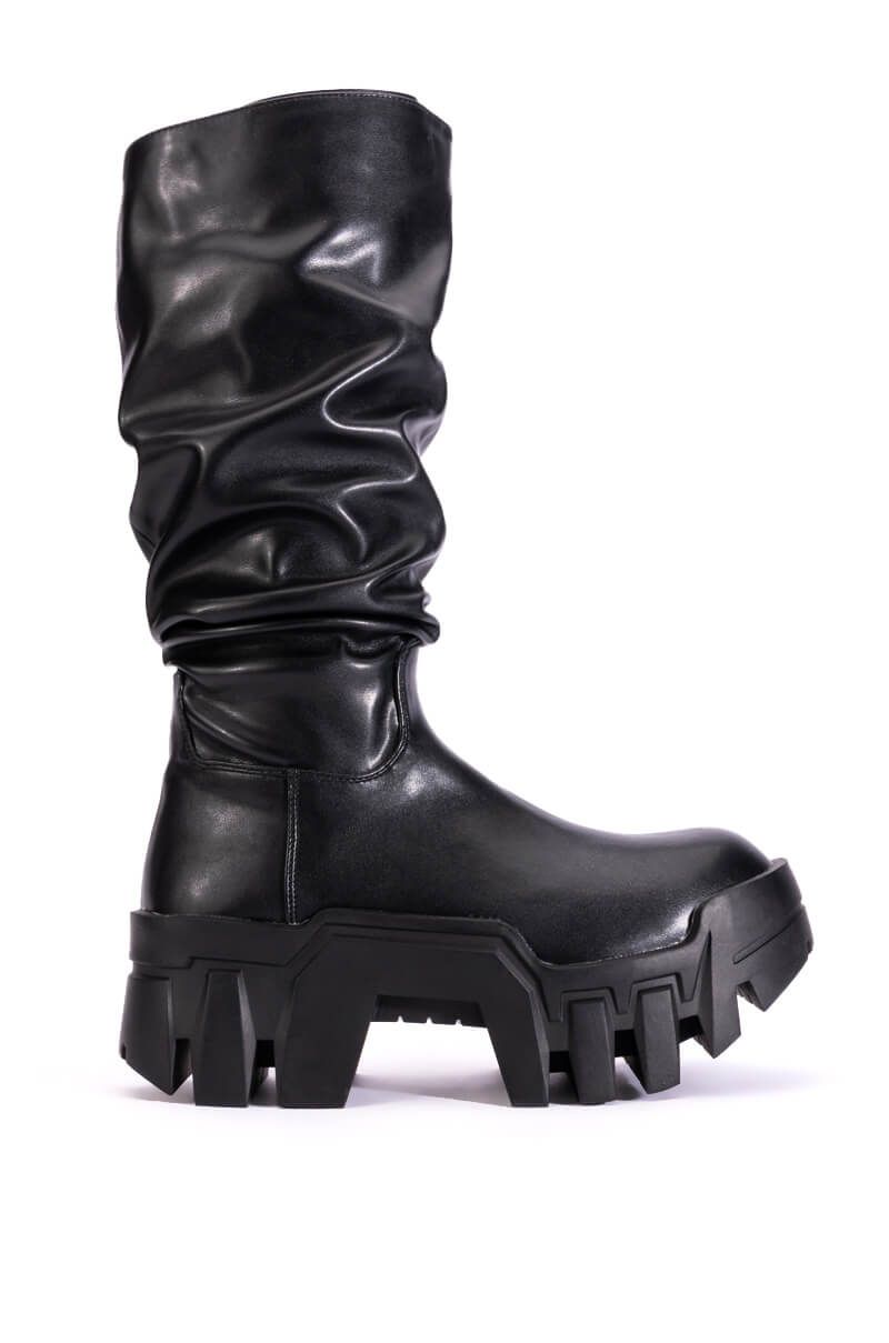 platform black faux leather boots with a chunky sole and scrunched leather shaft