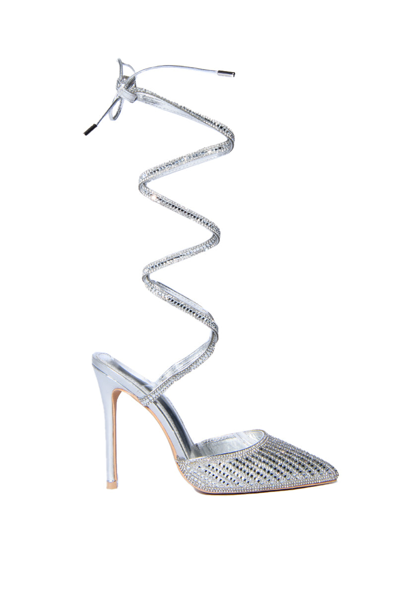silver stiletto heels with rhinestone embellished front and wrap up cords