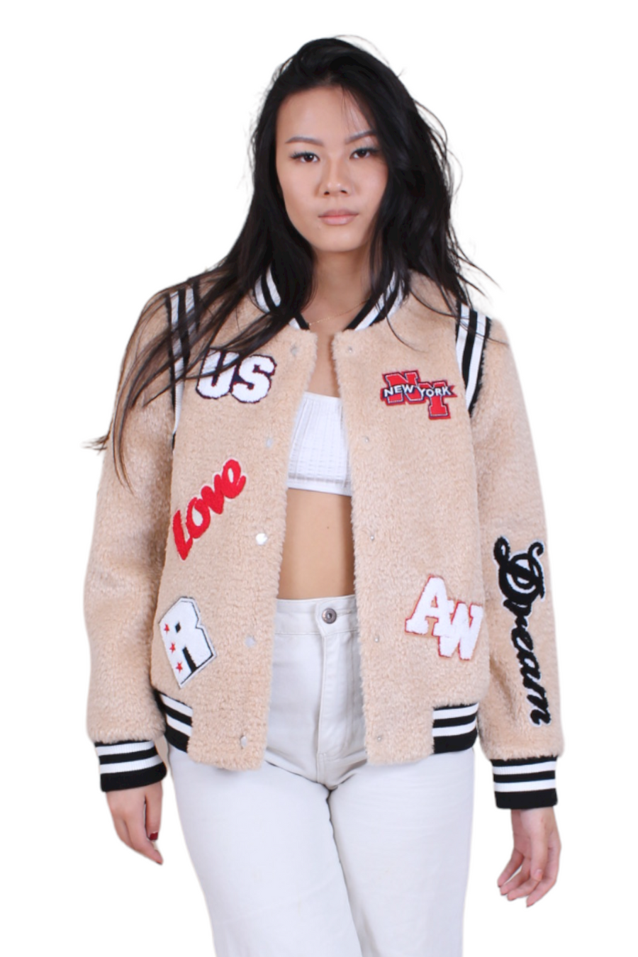 pale nude bomber statement jacket with teddy material and varsity patches