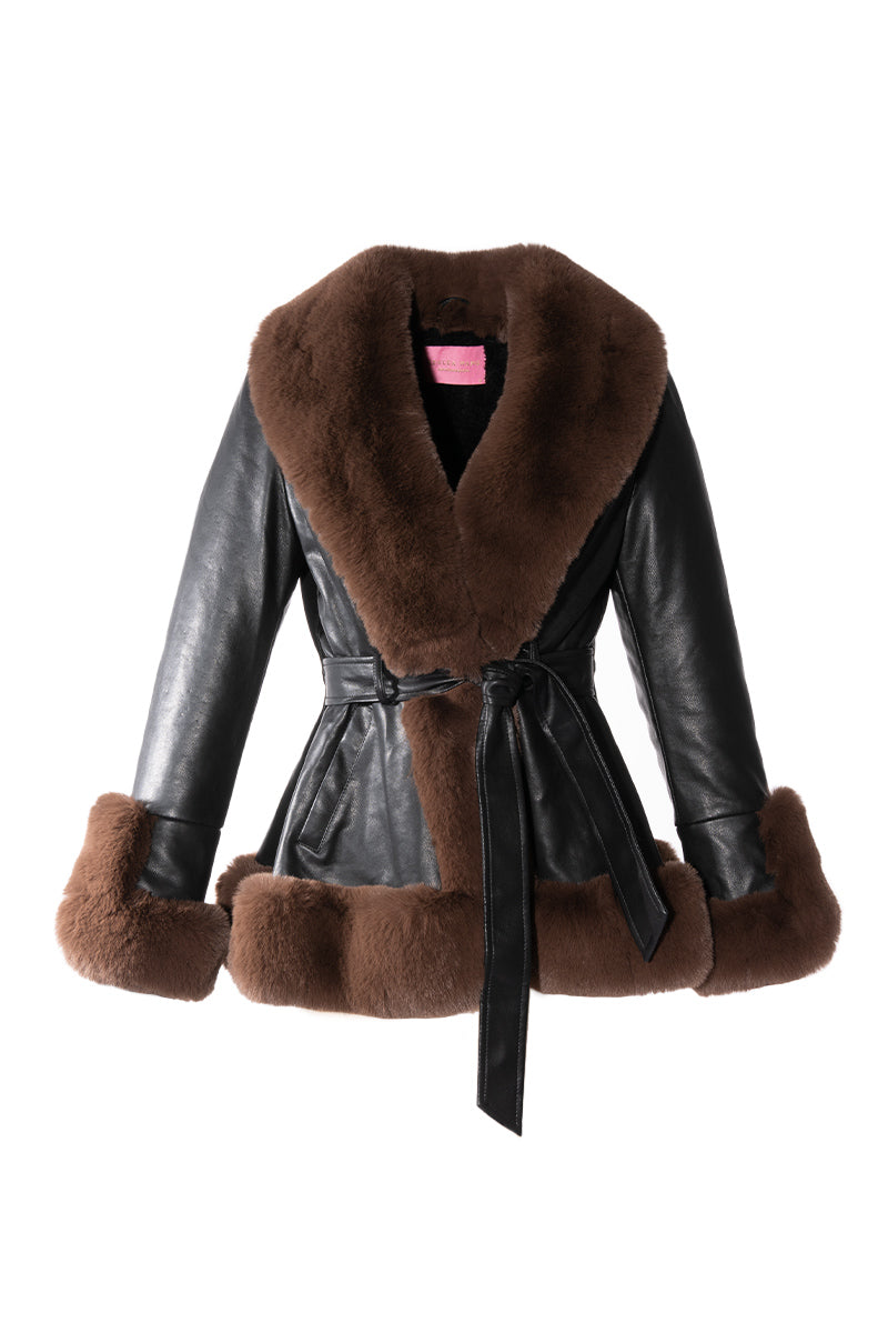 Black plus sized faux leather jacket with a cinched waist and brown faux fur collar and cuff trim