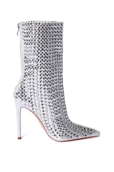 Silver stiletto heel boots with a zip closure and rhinestone bedazzle