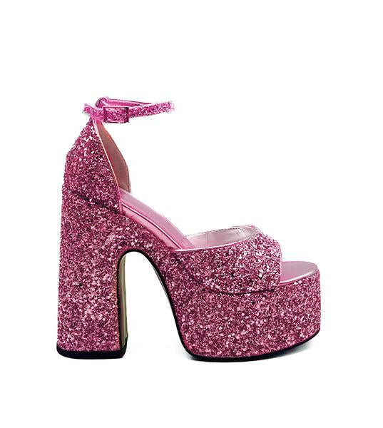pink glittery platform heels with an open toe silhouette