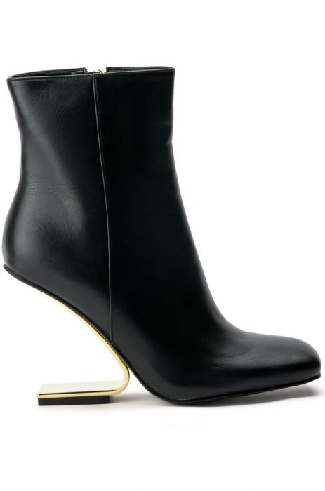 black faux leather boots with a gold ghost heel