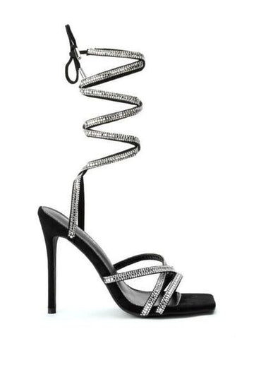 black strappy stiletto heels with an open toe and crystal wrap up heel cords